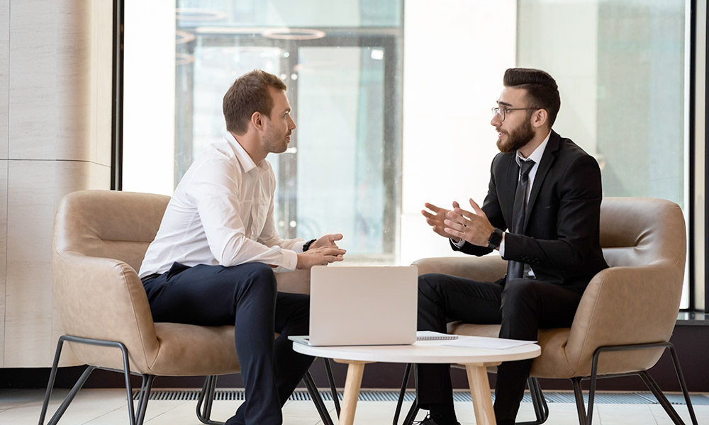 Office image that shows discussion